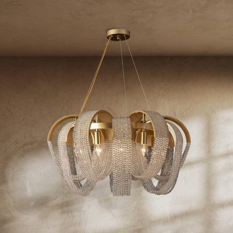 Gold arcs holding curtains of fine crystal beads around a lit center