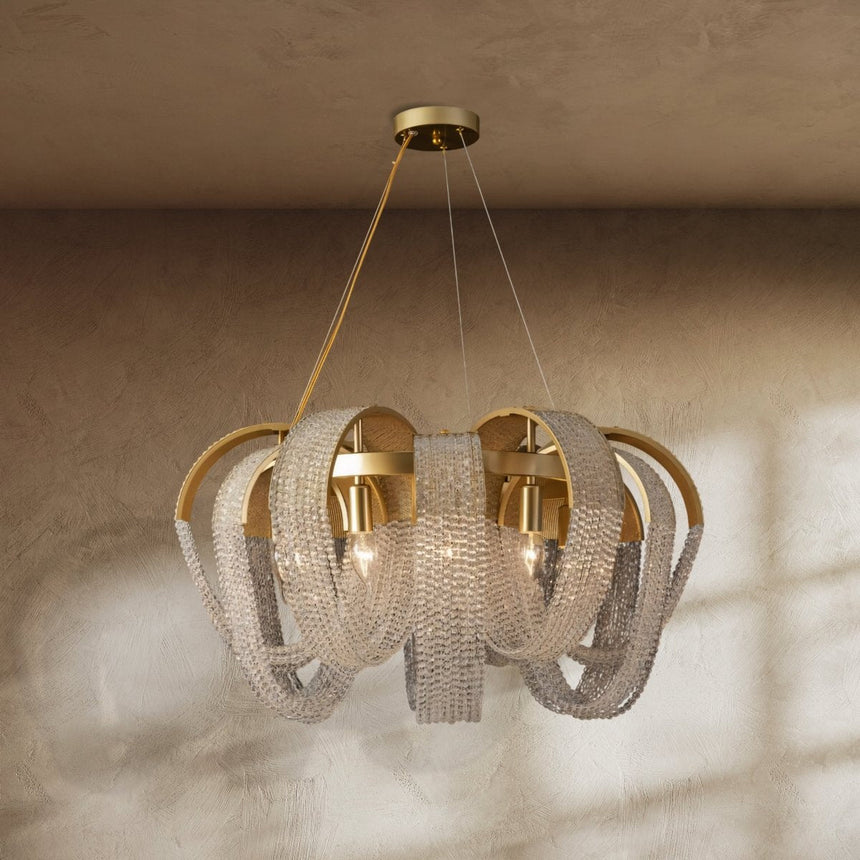 Gold arcs holding curtains of fine crystal beads around a lit center