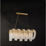 The linear version, a row of bead curtains hung under a flat gold bar