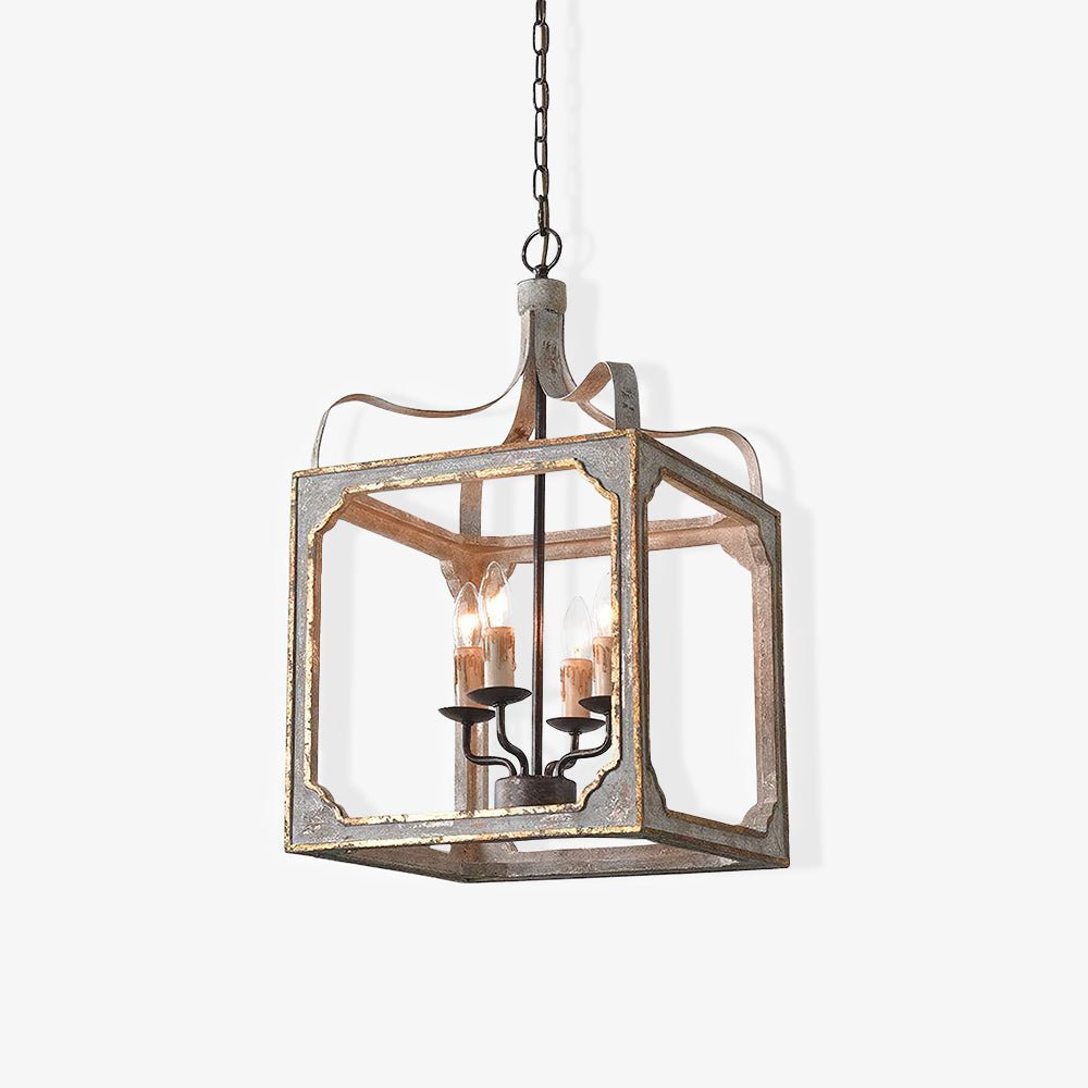 A washed wood cube frame with metal corners holding four candle lamps inside