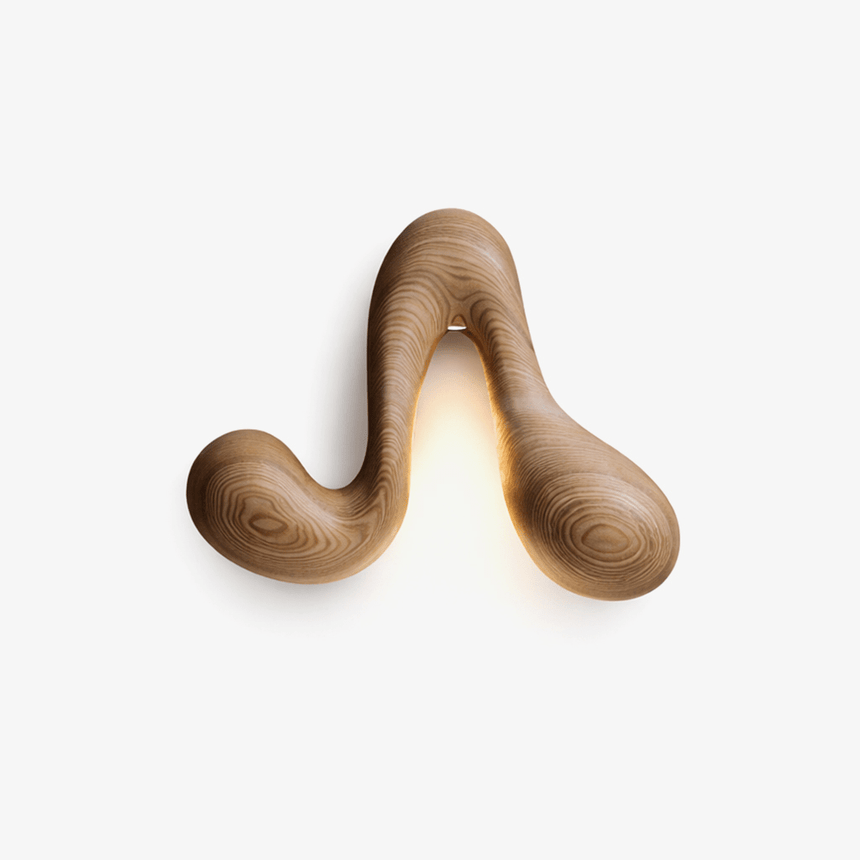 Curved wall sconce, an organic wood ribbon with a concealed downlight