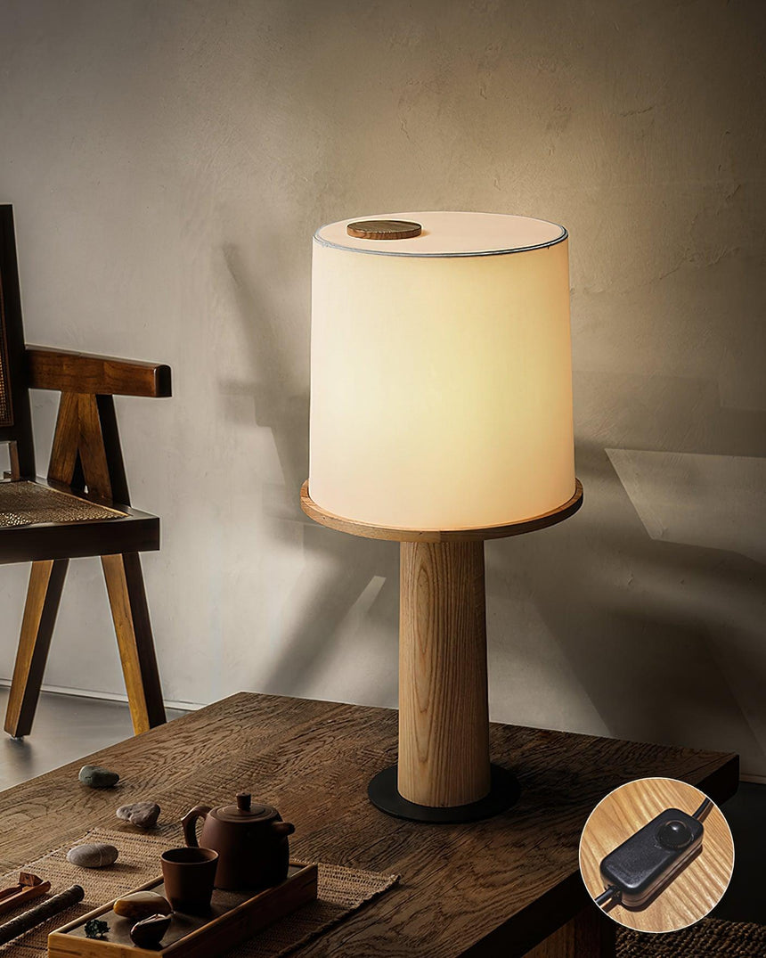 Cylinder table lamp lit close with the rotary control on the cord