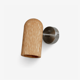 Cylinder wall sconce, a fluted oak cylinder on a nickel ball joint