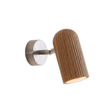 Fluted oak cylinder lit, angled down from its brushed nickel backplate