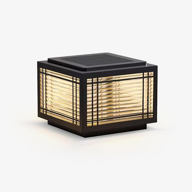 Square post cap with a ribbed glass lantern behind a slim black grid