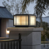 The cap lit on a rendered pillar with a palm and a dark sky behind
