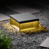 The upper face seen from above, the solar panel covering most of the lid