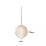 The white sphere drawn with its 30 cm width marked