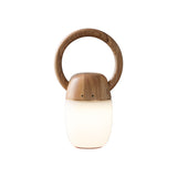 Dimmable bedside lamp in natural wood, lit and seen from the front