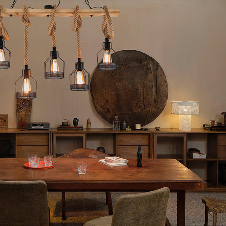 Chandelier lit over a wood dining table with chairs and a low sideboard