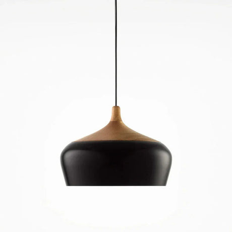 Black dome with its wood collar on a plain background