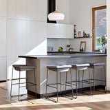 Two domes above a dark kitchen island