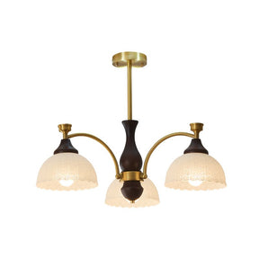 The three light build, three ribbed domes on a dark wood column