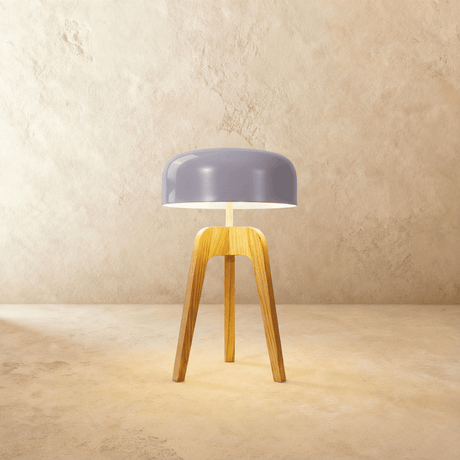 The short version in light wood with the pale dome lit, legs cut wide and low