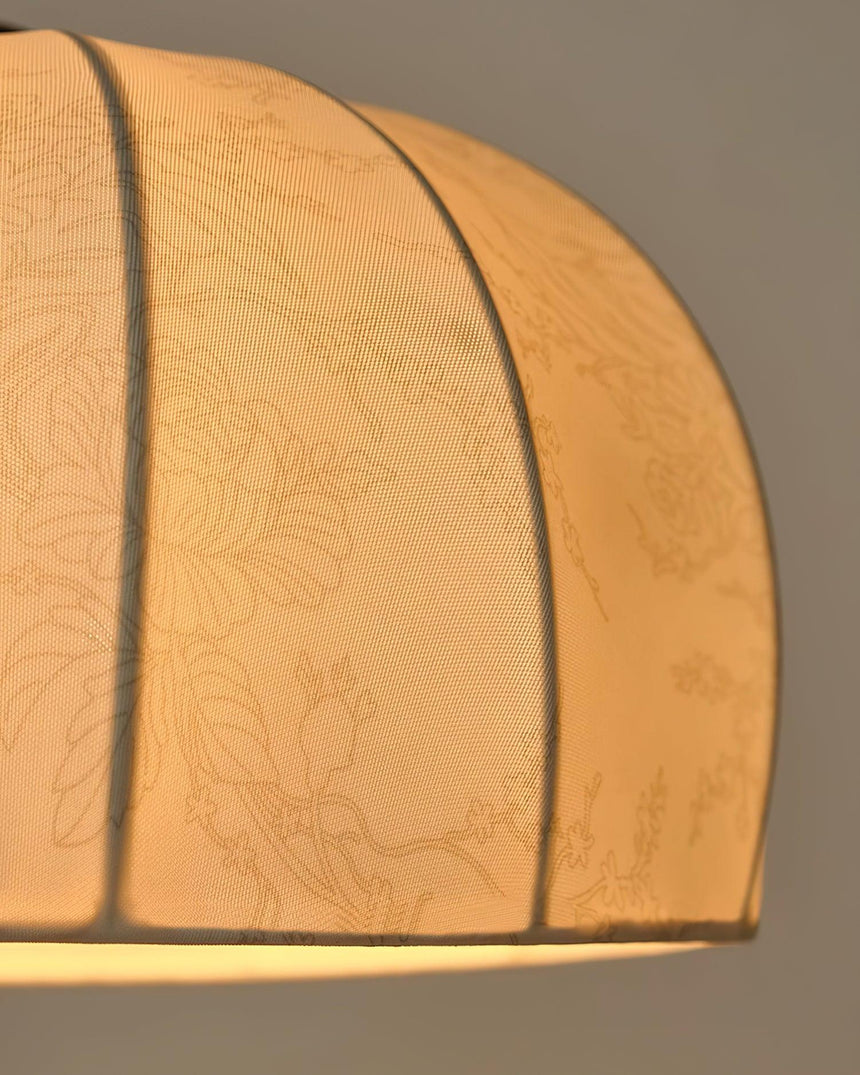 Close view of the lit shade with the seams reading as dark lines
