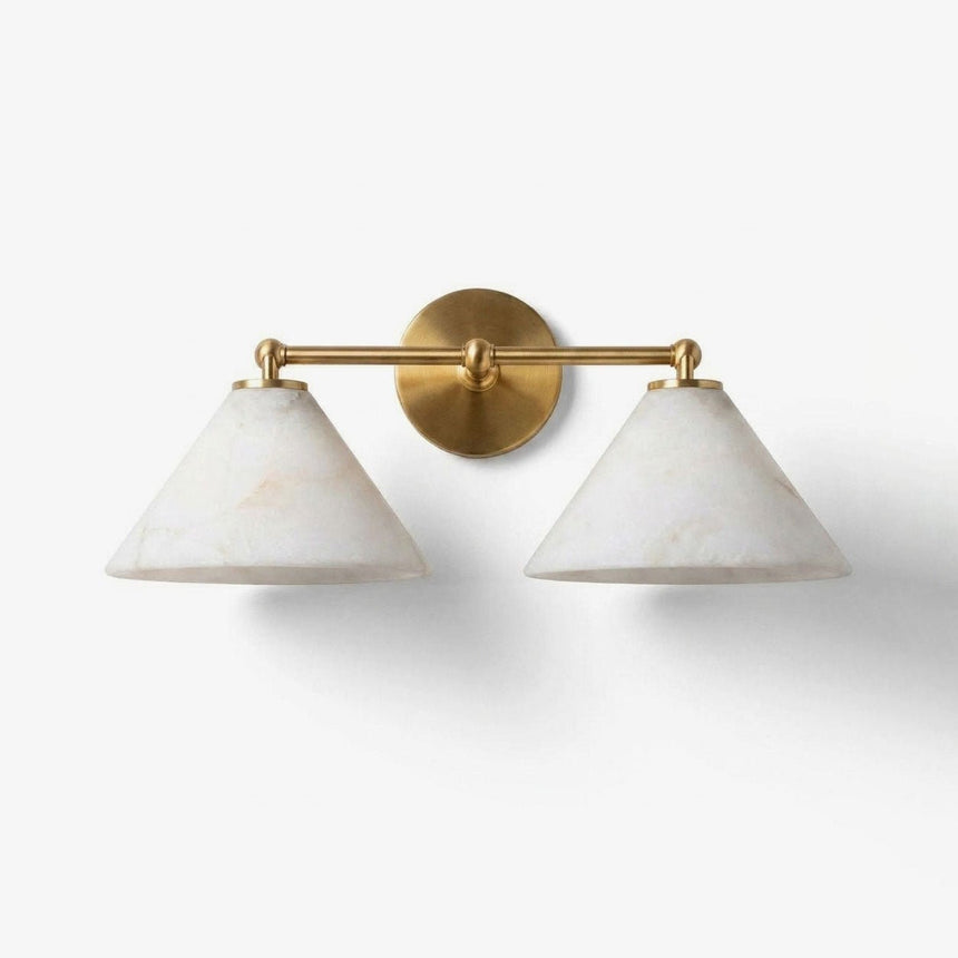 Two tapered stone shades on a horizontal brass bar with a round wall plate