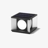Cube post light with a round lit disc set into each of its four faces