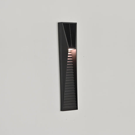 The solar light seen at an angle on a light wall, the tapered shape visible