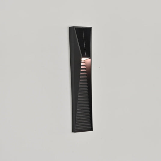 The solar light seen at an angle on a light wall, the tapered shape visible