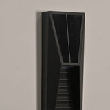 The top of the housing from the side, the cell above the louvered face