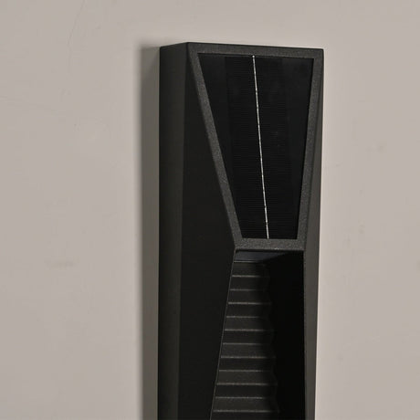 The top of the housing from the side, the cell above the louvered face