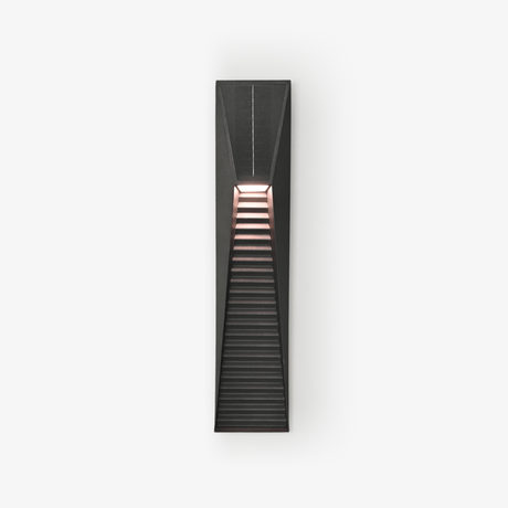 Narrow black solar wall light with a louvered front and a warm light at the top
