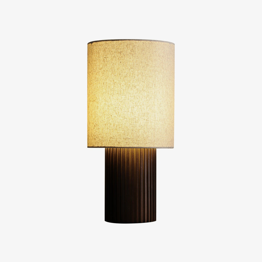 Entryway table lamp with the black fluted base, plain background