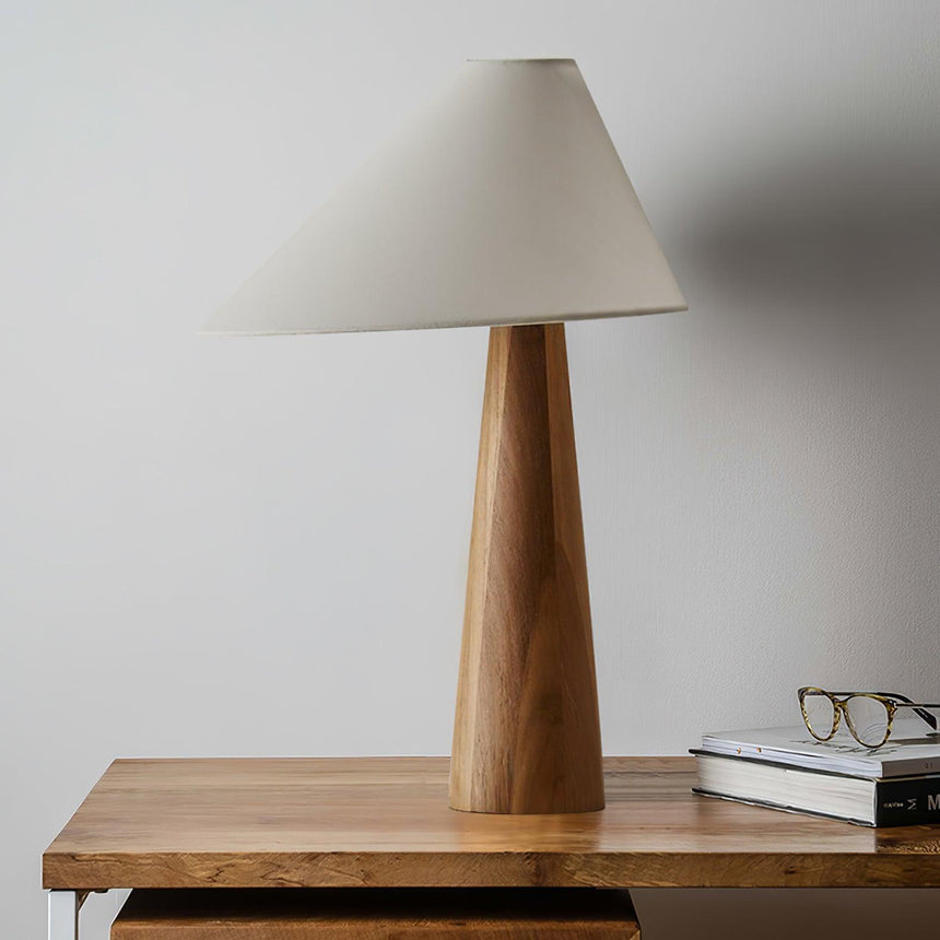 Close front view of the wood cone base under the shallow linen shade