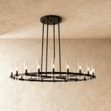 The black ring seen at an angle, the glass tubes lit along the flat band