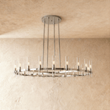 The same wide ring in polished nickel with lit glass candle tubes all around