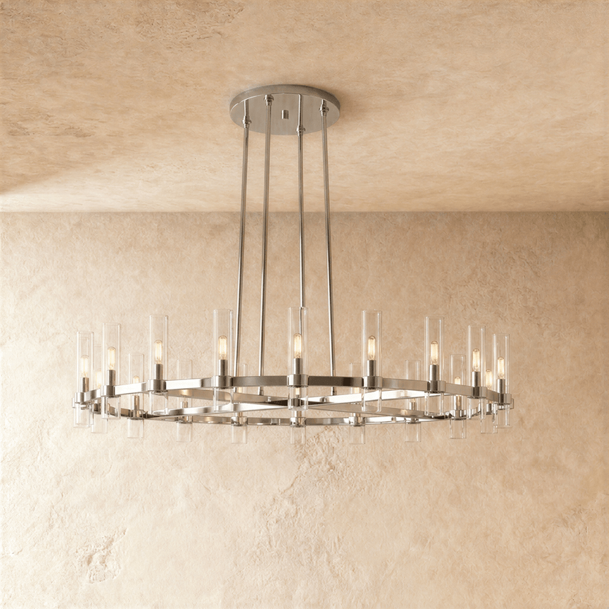 The same wide ring in polished nickel with lit glass candle tubes all around