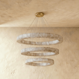 Three graduated stone rings hung one below the other, unlit
