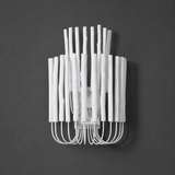 White rod sconce unlit against a dark charcoal background
