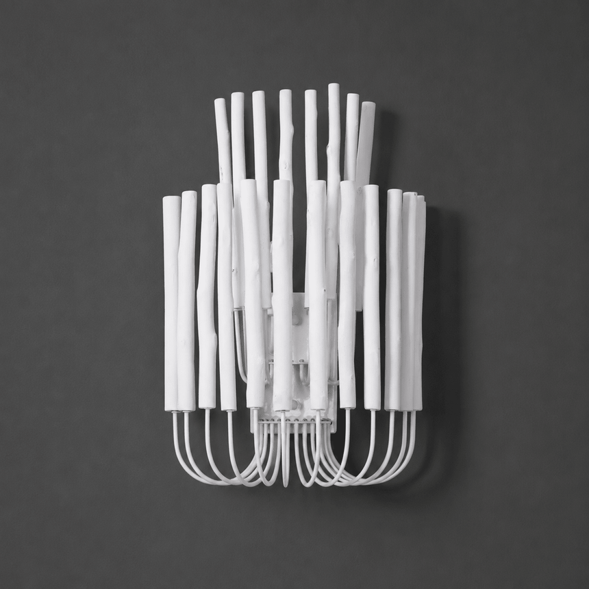 White rod sconce unlit against a dark charcoal background