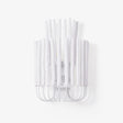 Extra large wall sconce built from white wood rods on a curved wire frame