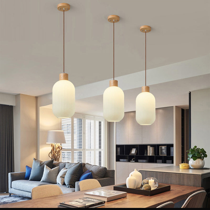 Wood Pendant Light Installed Above Dining Table