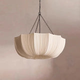 Fabric ceiling light with a gathered shade hung on a chain