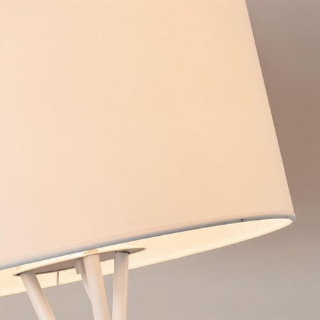 The underside of the drum shade, the fabric lit evenly from inside the rim