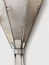 Close view of the metal frame holding the alabaster blades
