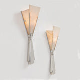The small and large sizes lit, the alabaster glowing warm