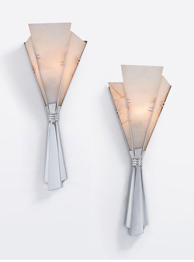 Both sizes lit on a white wall to compare their height