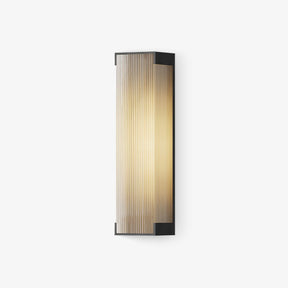 Flat outdoor wall light in black with a ribbed translucent lit face