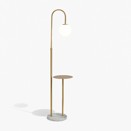 The same lamp with the glass globe lit, the wooden tray below on a pale stone base