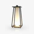 Tapered open frame lantern in dark metal with a lit inner panel