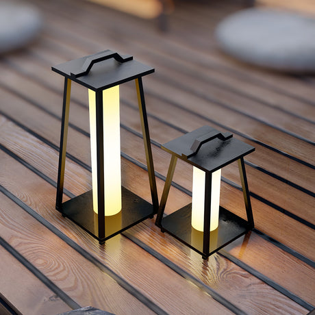 Two sizes lit on a timber terrace at the edge of the boards