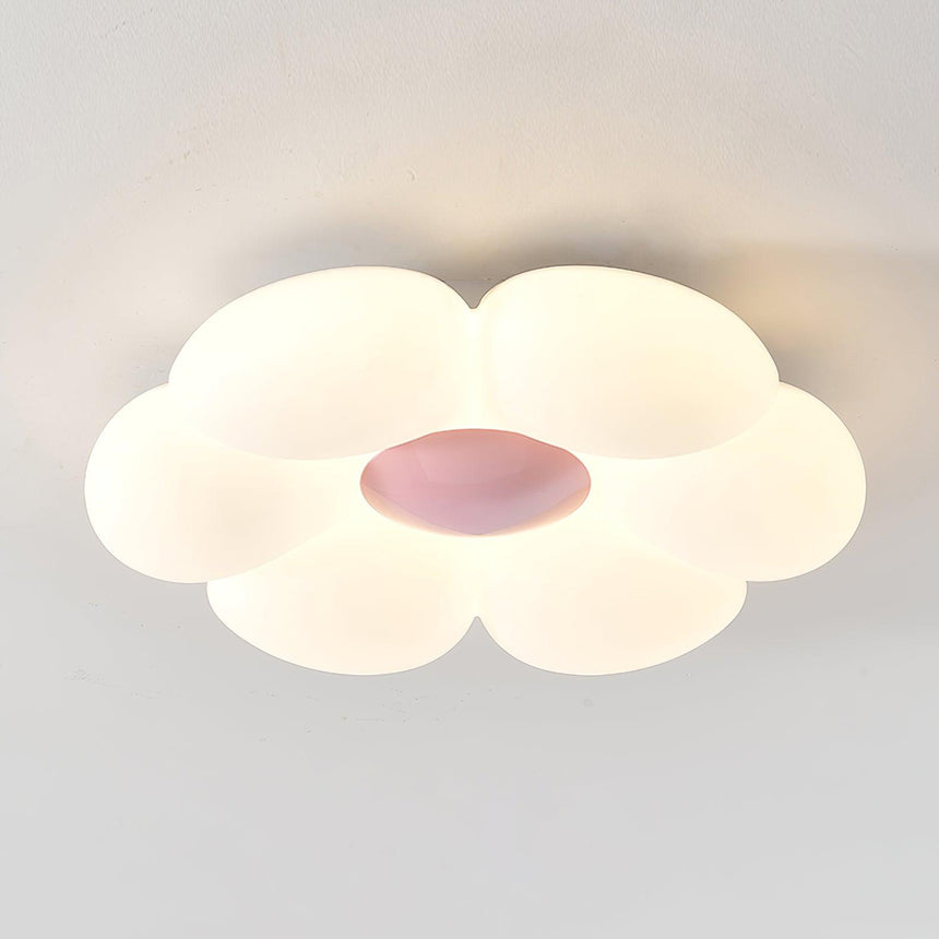 Flower ceiling light with a pink center shown on a plain backdrop