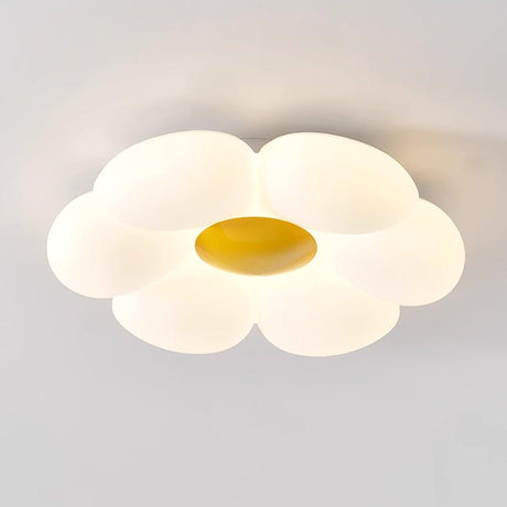 Flower ceiling light with a yellow center shown on a plain backdrop