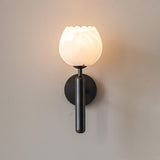 The black version with its stone flower shade on a pale background