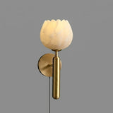 The brass version with its stone flower shade on a gray background