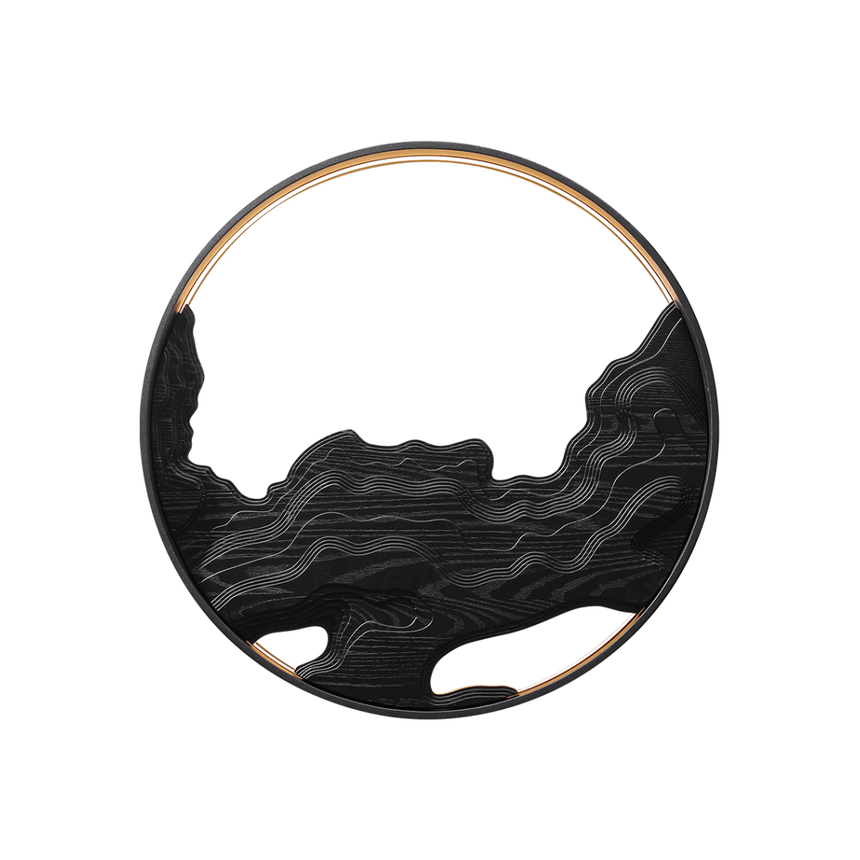 The same disc finished entirely in black, carved layers and ring together